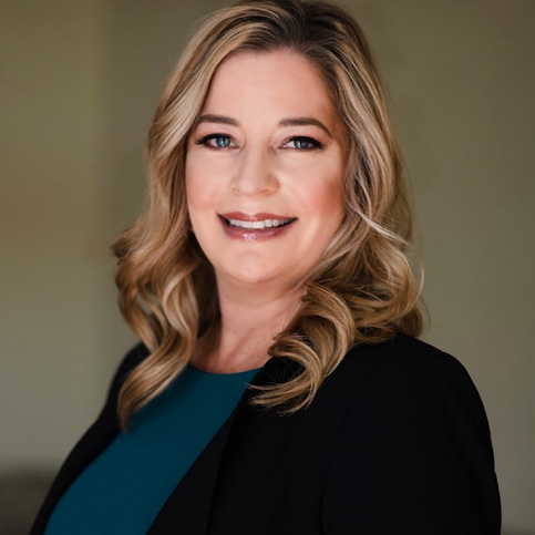 boardofdirectors—Alethea-Arguilez A woman with long blonde hair wearing a black jacket.